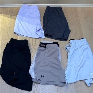 9 pairs of Athletic Shorts - 2 Black. 3 Grey 1 Purple 1 dark Grey and 2 Khaki